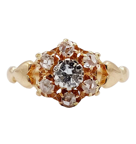 Bague 48.5 Bague marguerite antique or rose ornée d'un diamant entouré de diamant et épaulé de petits cœurs 58 Facettes A04895