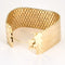 Bracelet Bracelet manchette en or jaune à maille nid d'abeille 58 Facettes CAL2622