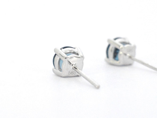 Boucles d'oreilles en or blanc avec topaze