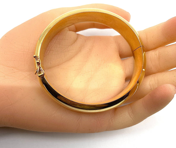 Bracelet Bracelet jonc en or 18 carats ouvrant, modèle lisse. 58 Facettes