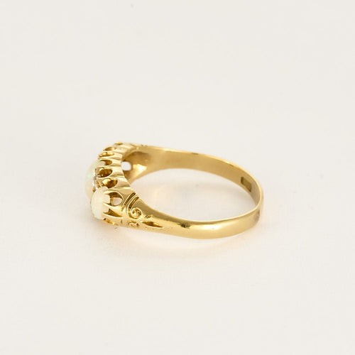 Bague 58 Bague type jarretière en or jaune, opales et diamants roses 58 Facettes MAR0975