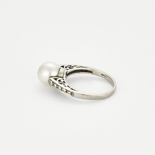Bague 54 Bague en or blanc, perle blanche de culture et diamants 58 Facettes DAX0008