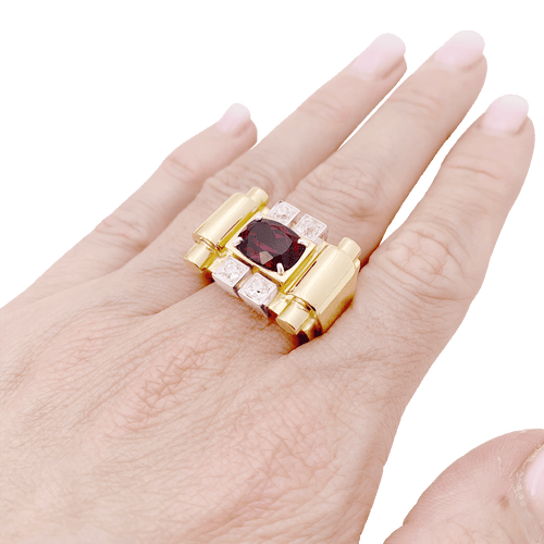 Bague 54 Bague "tank", deux tons d'or, grenat et diamants. 58 Facettes 34577