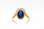 Bague Bague or jaune, platine, saphir cabochon 58 Facettes 250101
