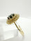 Bague 59 Bague en or jaune sertie d'un saphir bleu foncé et d'un halo de diamants. 58 Facettes 50355