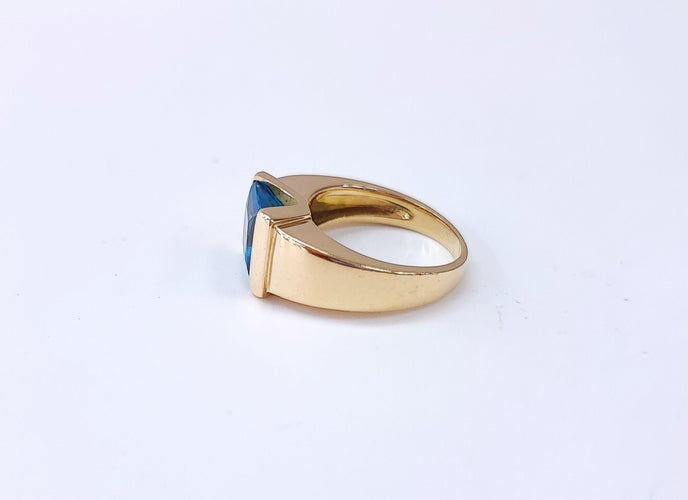 Bague or jaune topaze bleue