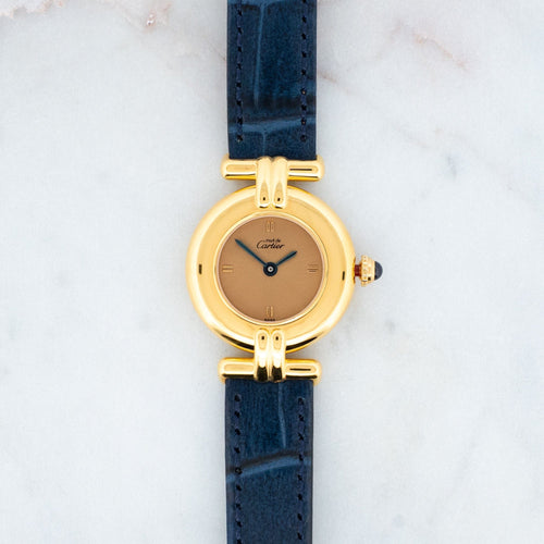 Montre Cartier Must Colisée - Bronze dial 58 Facettes