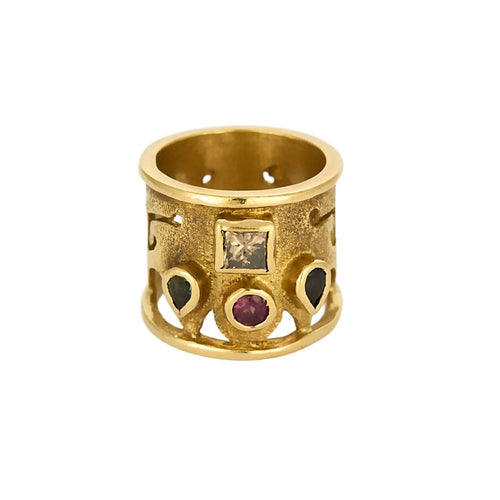 Bague en Or jaune diamant, péridots et grenat