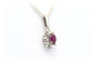 Pendentif Pendentif 1970 en or blanc serti d'un grenat et de diamants 58 Facettes B634