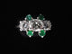 Bague 56 Bague or blanc diamant ovale de 0,70 carat et émeraudes 58 Facettes