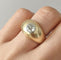 Bague bombée en or jaune 18K et diamant