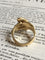 Bague 51 Bague ancienne en or jaune 18K représentant deux serpents 58 Facettes