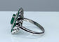 Bague Bague marguerite en or blanc 18 carats en émeraudes et diamants 58 Facettes AB216