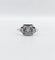 Bague 53 Bague art deco or blanc 18k ornée d'un diamant rond dans une monture géométrique finement travaillée (circa 1930) 58 Facettes A04979