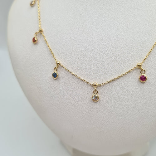Collier Collier or jaune serti de saphirs multicolores et diamant 58 Facettes