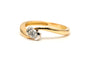 Bague contemporaine en or jaune et blanc 18 carats sertie d'un diamant "taille" brillant (+-0.16ct)