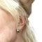 Boucles d'oreilles BOUCLES D'OREILLES AU DESIGN CONTEMPORAIN DU XXE SIÈCLE EN OR 18 KT AVEC DIAMANTS ET ÉMERAUDES 58 Facettes Q96B