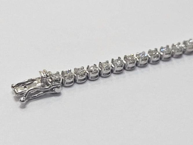 Bracelet Bracelet tennis en or blanc, diamant 2,46 ct, serti griffes tournées 58 Facettes Q399B