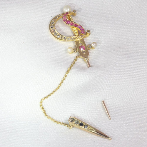 Montre Épingle en or antique en forme d'épée ornée de bijoux 58 Facettes 21092-0169