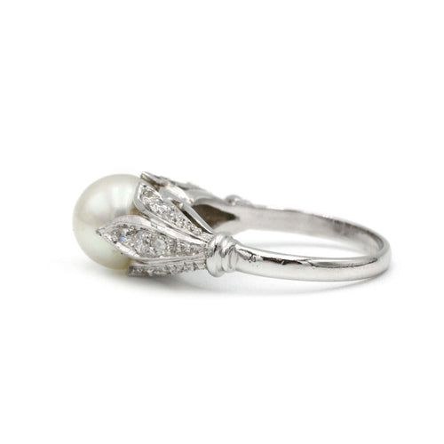 Bague 52 Bague or, diamants et perle 58 Facettes 1150