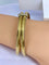Bracelet Bracelet double joncs, or blanc, diamants, Yves Saint Laurent 58 Facettes AB601