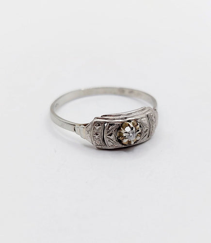 Bague 56 Bague Art Déco or blanc, diamant et monture géométrique (circa 1920) 58 Facettes A06246