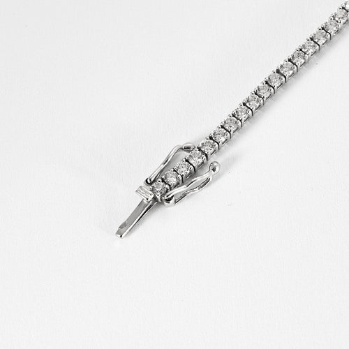 Bracelet Bracelet tennis en or blanc et diamants 58 Facettes B240624