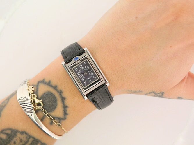 Montre vintage montre CARTIER tank basculante 2386 quartz 32 mm en acier tilting 58 Facettes 271152