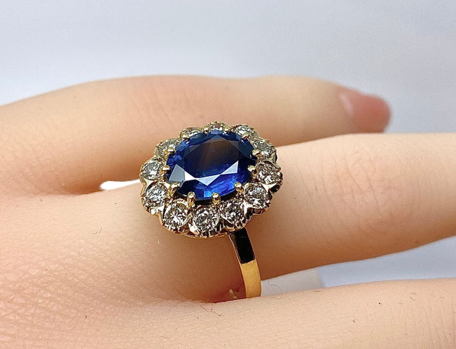Bague 50 Bague marguerite en or jaune 18 carats, saphir 3,50 carats et diamants 58 Facettes AB548