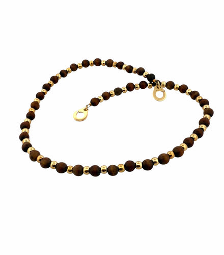 Collier Collier Dinh Van en or jaune 18 carats et boule en bois 58 Facettes