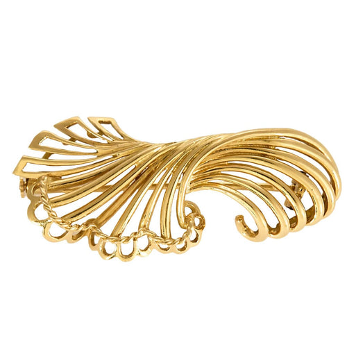 Broche Broche en or jaune à motif de volutes ajourées 58 Facettes SAI03673