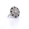 Bague Bague en or blanc ornée d'un travail ajouré spécial 58 Facettes