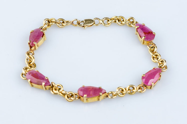 Bracelet Bracelet en or jaune orné de rubis 58 Facettes BRARV14KCC925