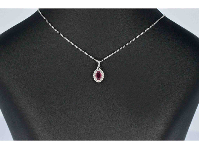 Pendentif Pendentif en or blanc serti de diamants et de rubis 58 Facettes 2017