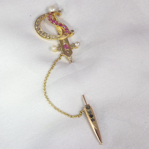 Montre Épingle en or antique en forme d'épée ornée de bijoux 58 Facettes 21092-0169