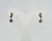Boucles d'oreilles Boucles d’oreilles pendantes en or blanc et diamants 58 Facettes