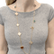 Collier Collier-Sautoir Van Cleef & Arpels, "Lucky Alhambra", or jaune, cornaline, malachite, oeil de tigre, nacre. 58 Facettes 34547