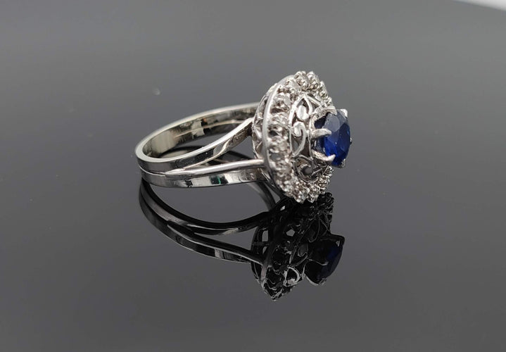 Bague 50 Bague or gris et platine, saphir, diamants 58 Facettes