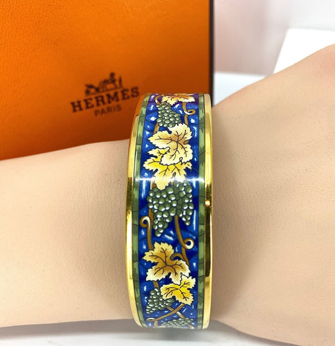 Bracelet HERMÈS - bracelet en métal doré et émail 58 Facettes AB657