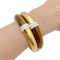Bracelet Bracelet ouvrant, or jaune, oeil de tigre et diamants. 58 Facettes 34624