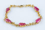 Bracelet Bracelet en or jaune orné de rubis 58 Facettes BRARV14KCC925