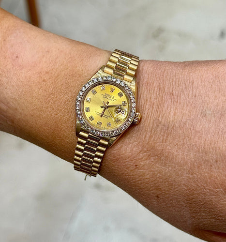 Montre Rolex Oyster perpetual Lady en or et diamants 58 Facettes