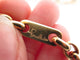Collier collier POMELLATO pendentif croix grenats + chaine en or 18k 81gr 58 Facettes 267203
