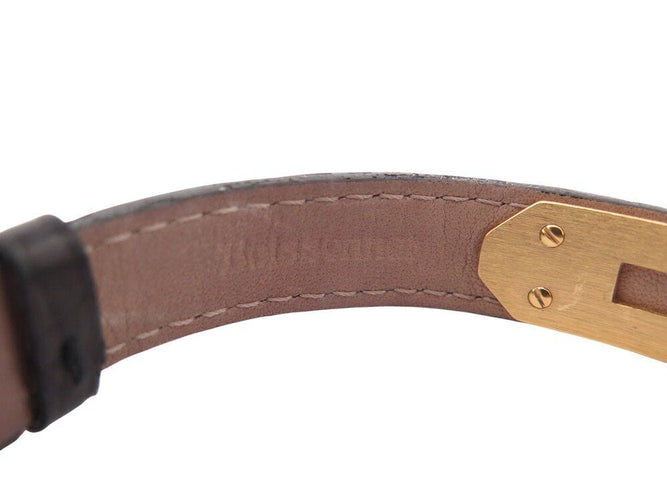 Montre montre vintage HERMES Kelly Mini Cadenas 20 mm plaque or quartz dame 58 Facettes 268902