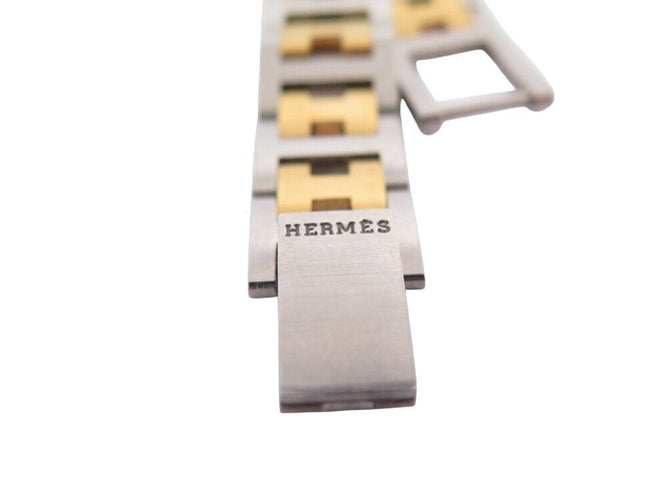 Montre vintage montre HERMES arceau 25 mm acier et plaque or quartz  plated 58 Facettes 268618