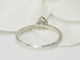 Bague Solitaire en or blanc et diamants en forme de poire 58 Facettes 24978