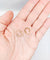 Boucles d'oreilles Mini créoles style Art Déco or rose 58 Facettes A06268
