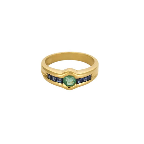 Bague en or jaune, émeraude et saphirs calibrés de synthèse