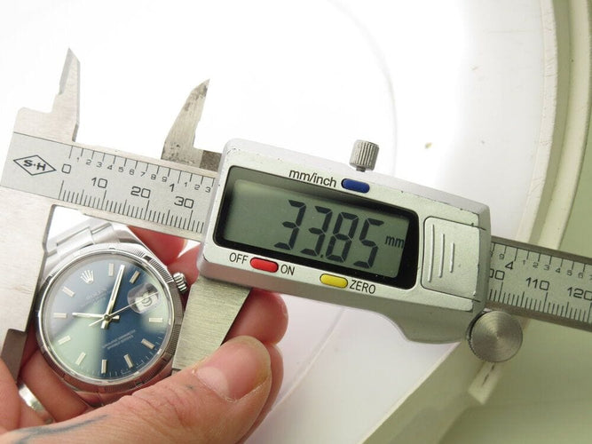 Montre montre ROLEX 15210 oyster perpetual date 34 mm acier automatique 58 Facettes 266340