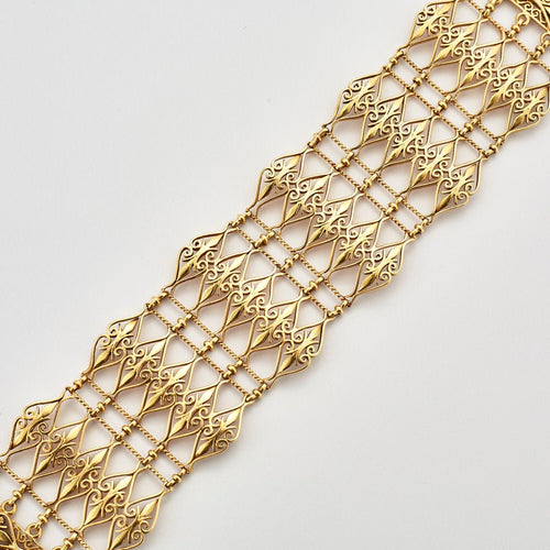 Bracelet Bracelet manchette à décor ajouré or jaune 58 Facettes